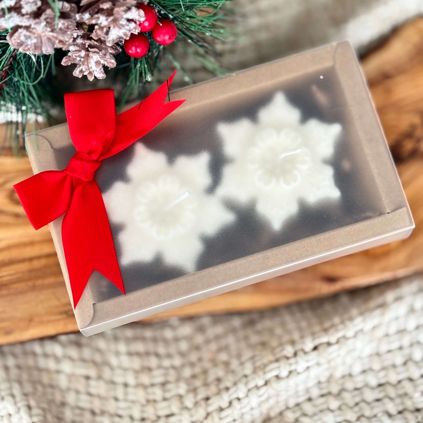 Natural soy wax snowflake candles ready for gifting with sustainable packaging