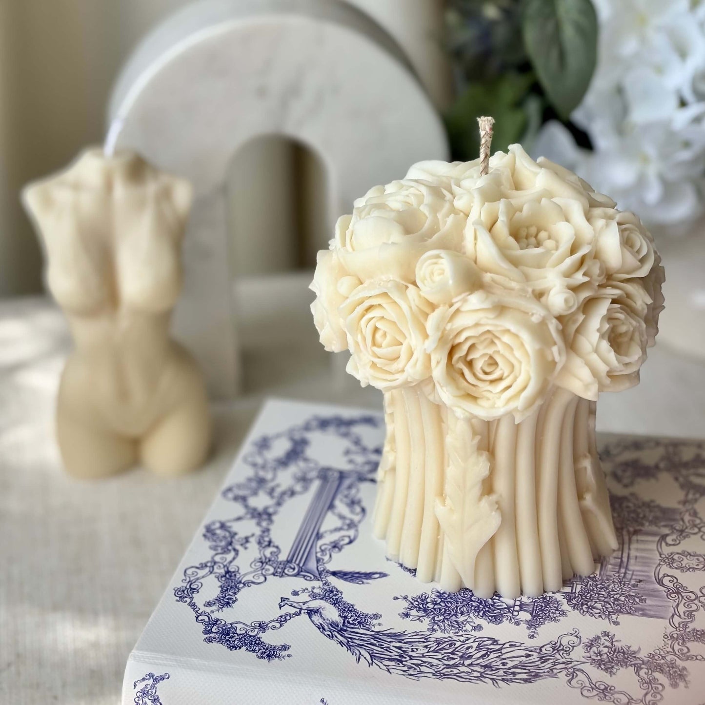 Ivory peony bouquet soy wax candle on a decorative plate, floral sculpture centerpiece for weddings, romantic handmade home decor.