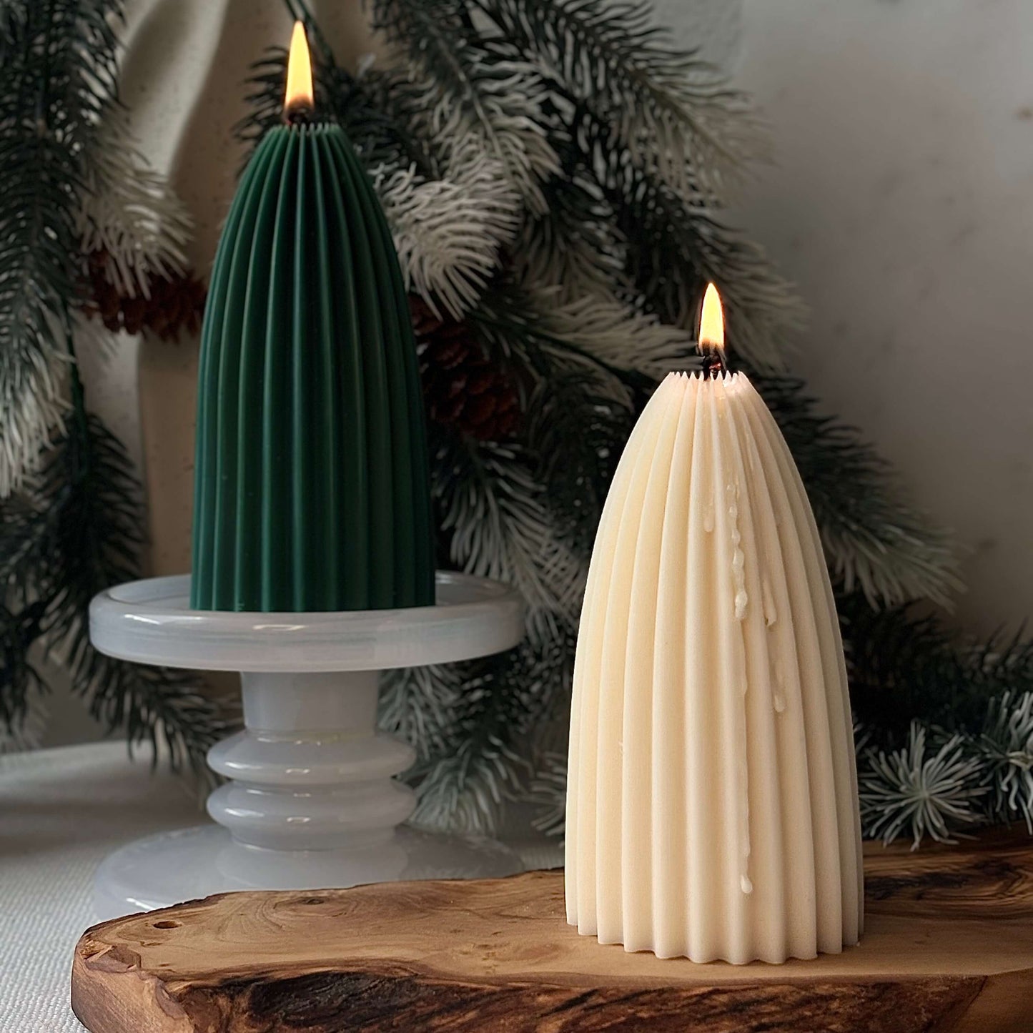Pair of modern soy candles, ribbed green and ivory, minimalist Christmas tree holiday accents