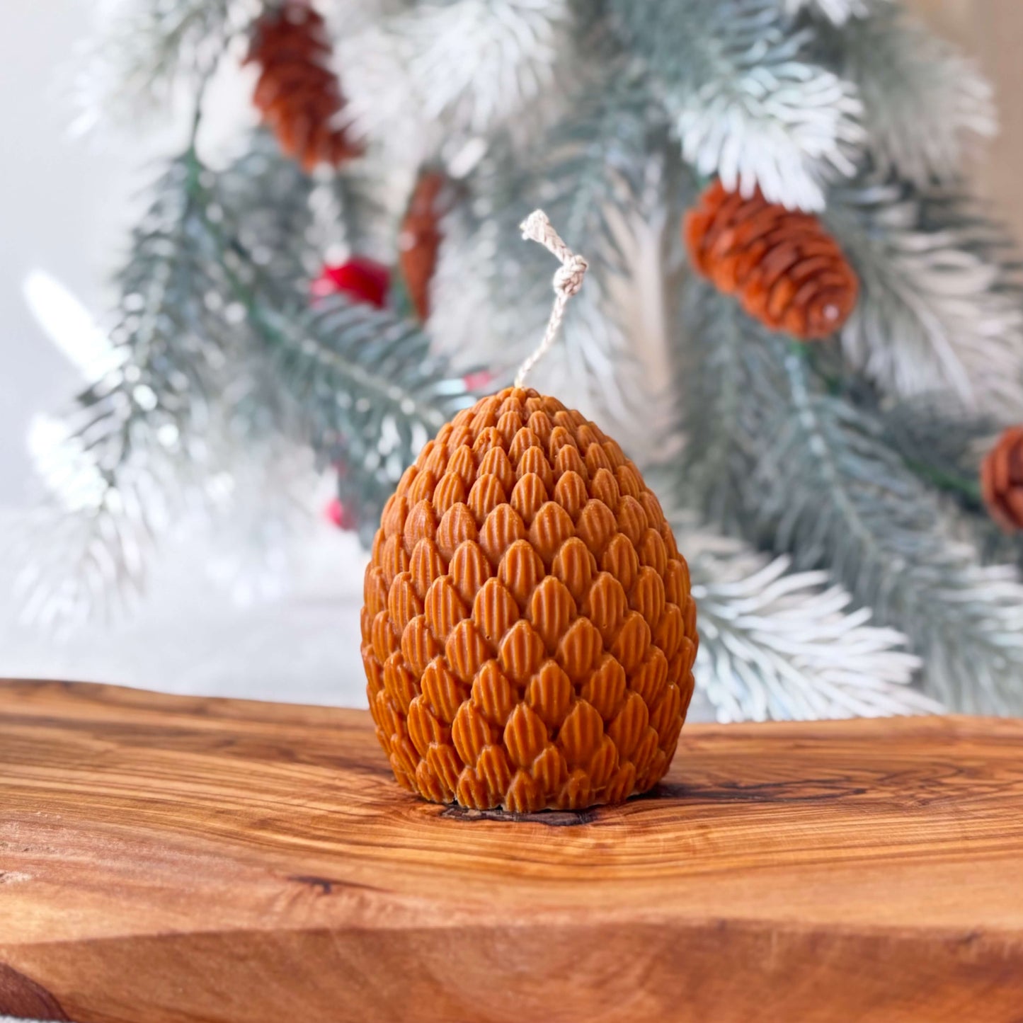 Eco-friendly pinecone candle crafted in California, decorative soy wax holiday piece