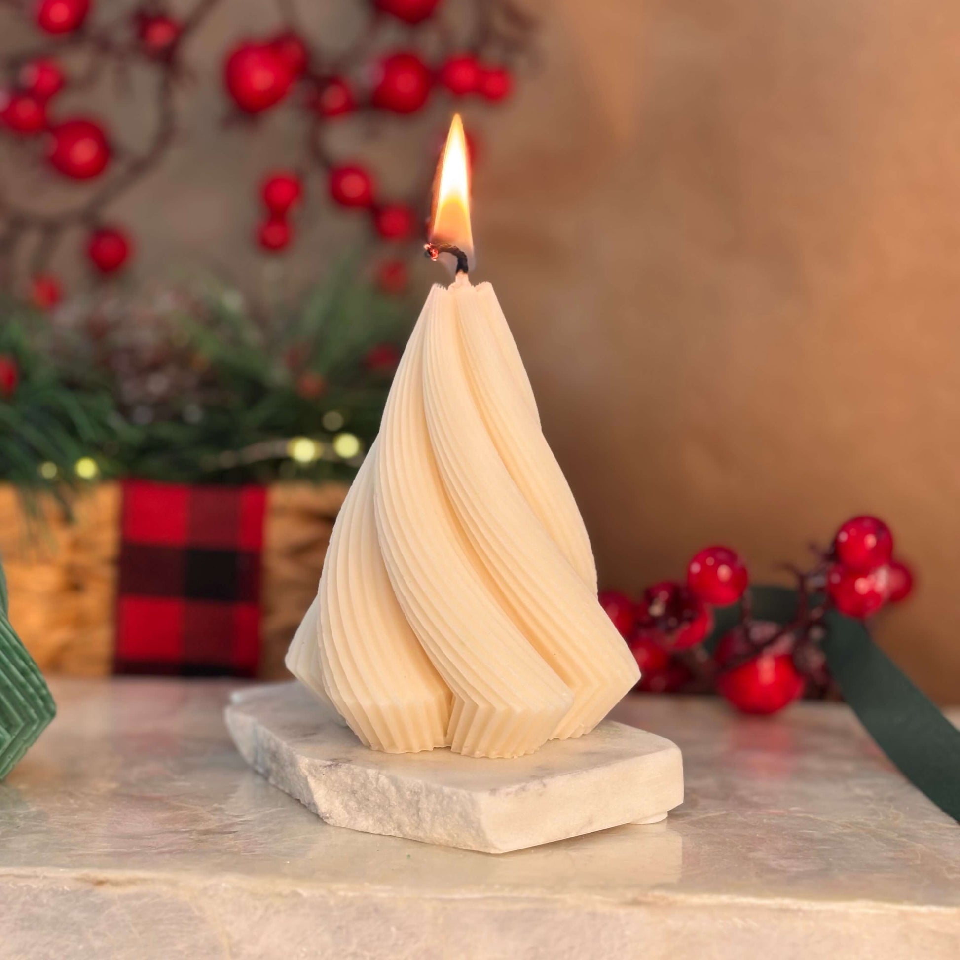 Burning spiral-shaped beige candle on marble tray, Christmas and Thanksgiving table centerpiece, perfect for cozy decor or gift for mom

