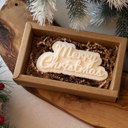 soy wax merry christmas candle in festive gift box with filler