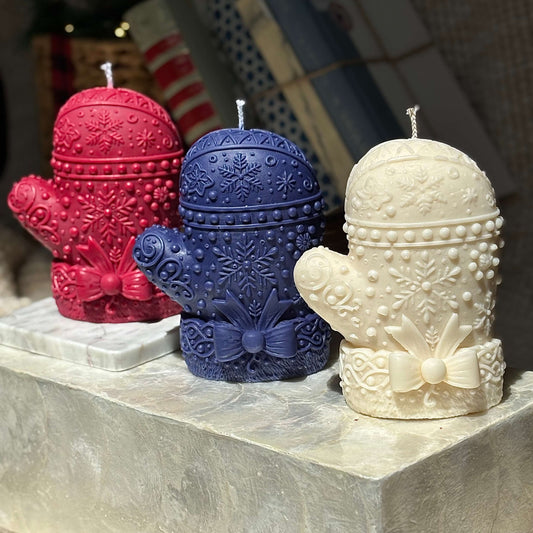 Handcrafted mitten candles in festive red, deep blue, and ivory white — Christmas decor, Secret Santa gift, soy wax holiday accent.
