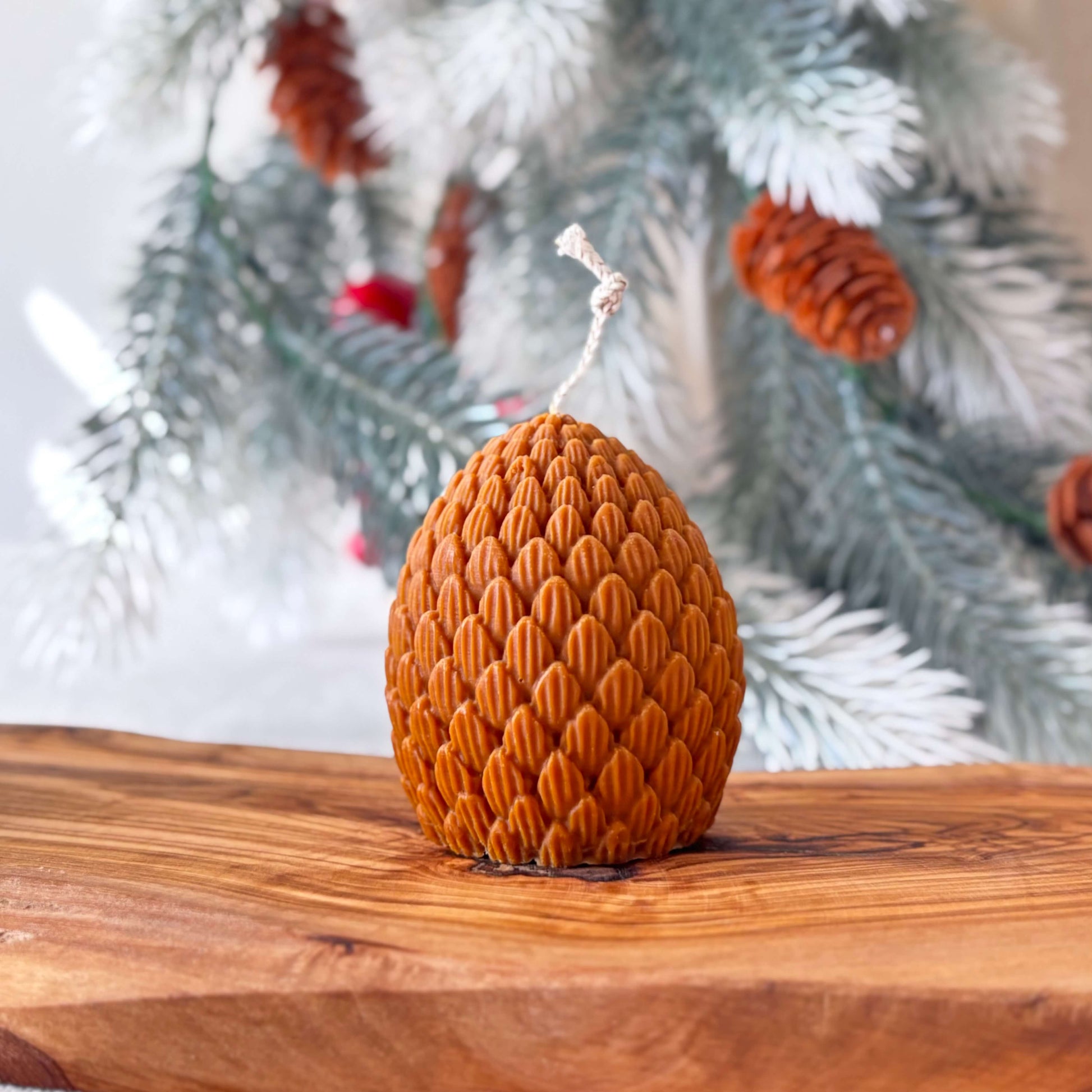 Eco-friendly pinecone candle crafted in California, decorative soy wax holiday piece
