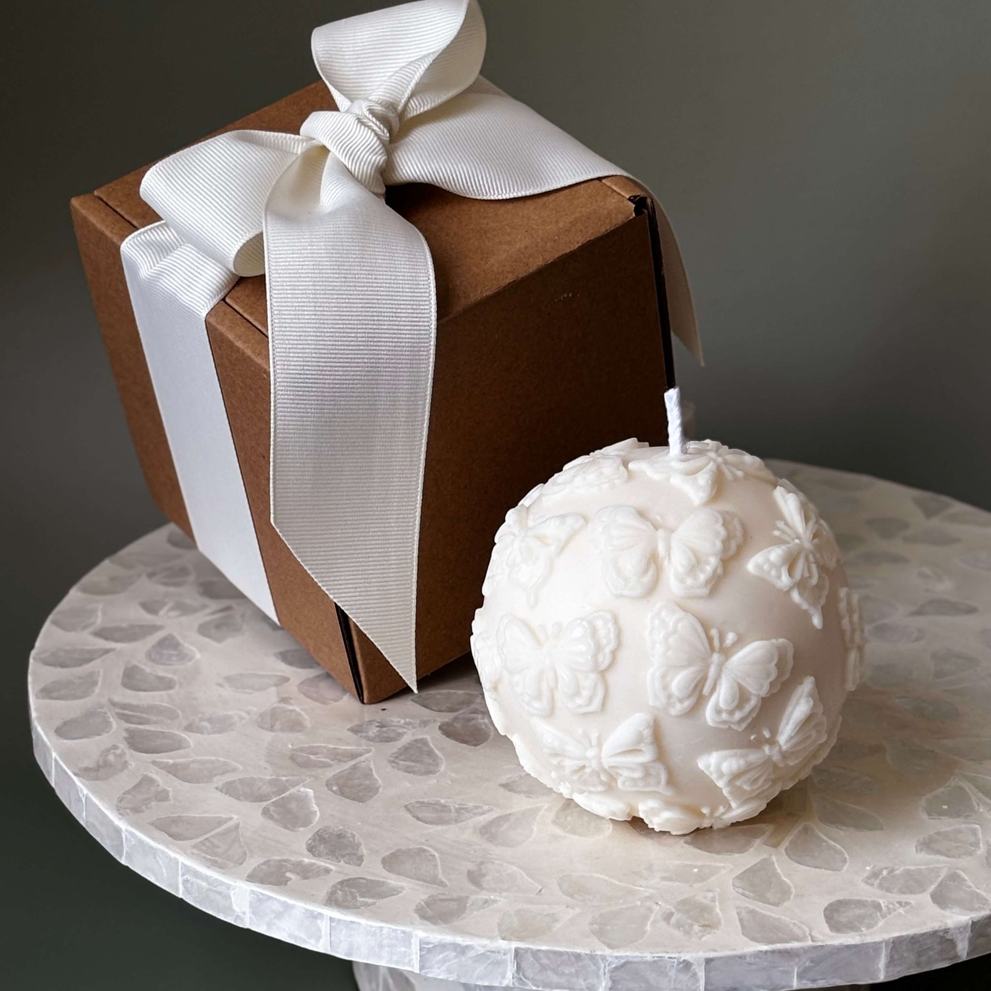 Handmade butterfly candle with gift box and white ribbon
