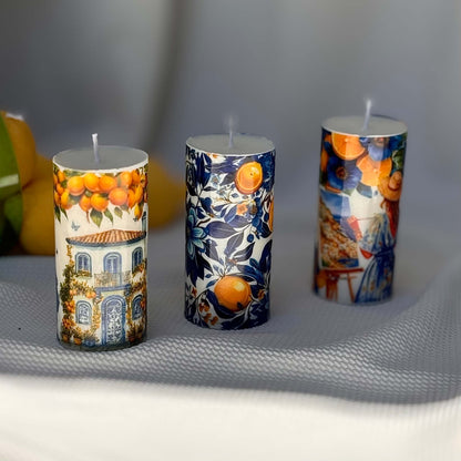 Decorative Italian-style candles with lemon house, floral prints and Mediterranean ceramic art