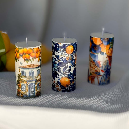 Decorative Italian-style candles with lemon house, floral prints and Mediterranean ceramic art