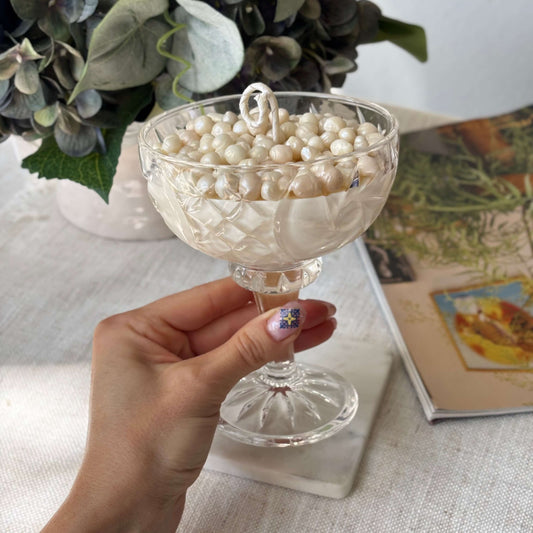 Handheld soy wax pearl candle in a glass coupe — luxury gift for mom and birthdays