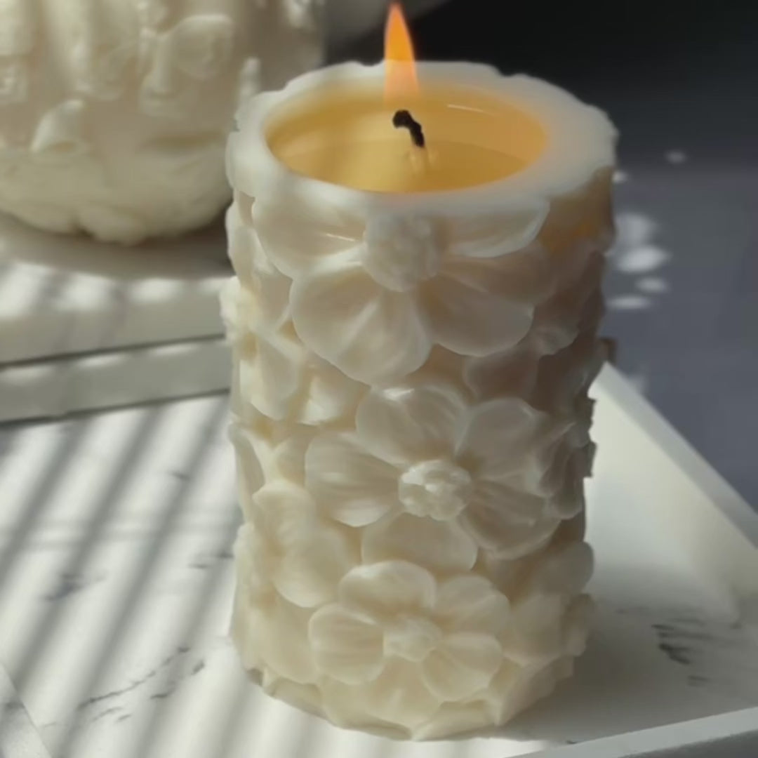 Video showing Petal Lace floral soy pillar candle burning close-up—sculpted petals, clean flame, cozy home decor vibe