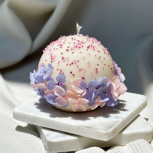 Handmade round floral soy candle decorated with hydrangea petals, perfect gift for her or unique home decor
