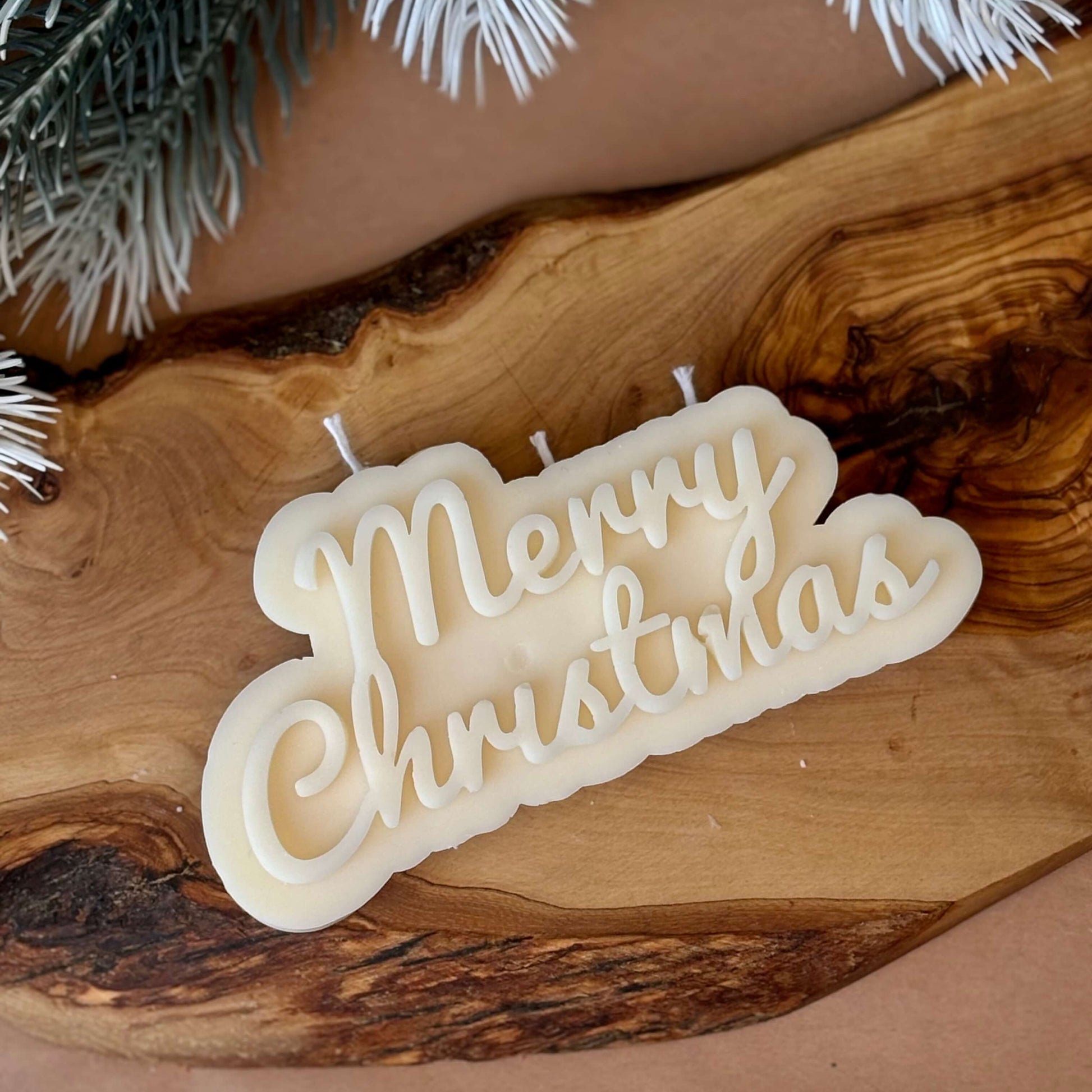 decorative soy wax candle shaped with merry christmas text for cozy winter home decor