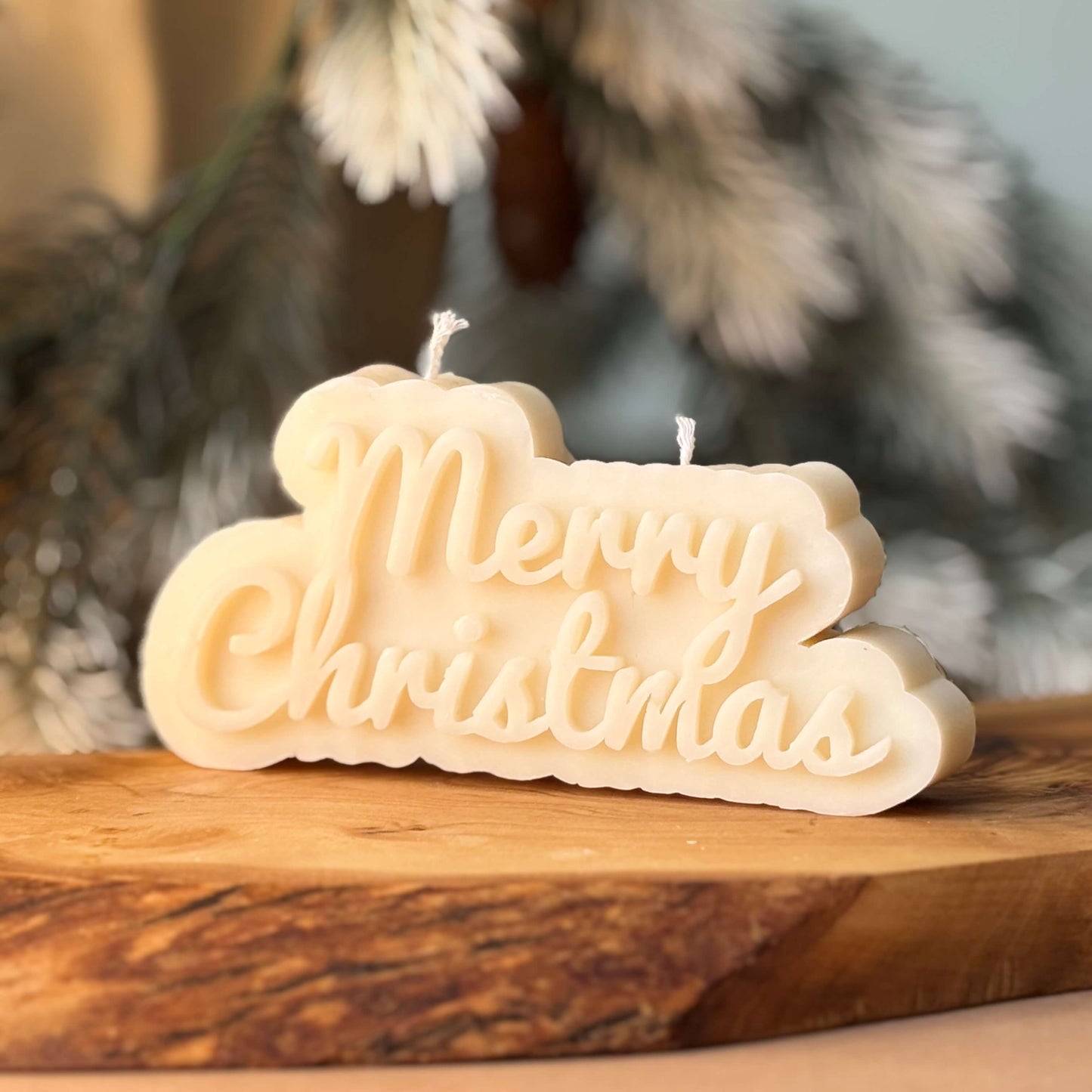 handmade soy candle with merry christmas design on wood board perfect for thanksgiving and winter holidays